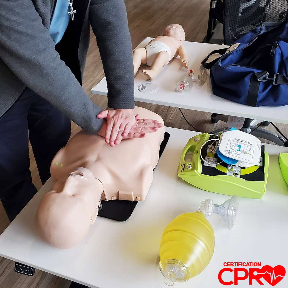 CPR training on mannequin for certification in Jacksonville.