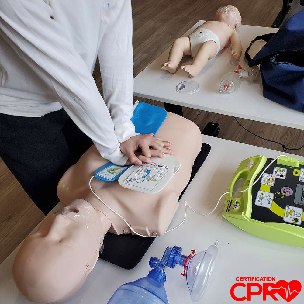 CPR training with mannequin and AED for certification in Jacksonville.