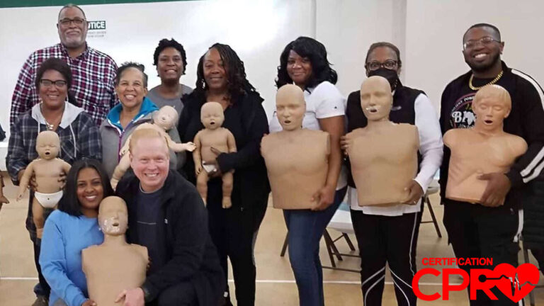Group CPR training session in Jacksonville with mannequins for certification.