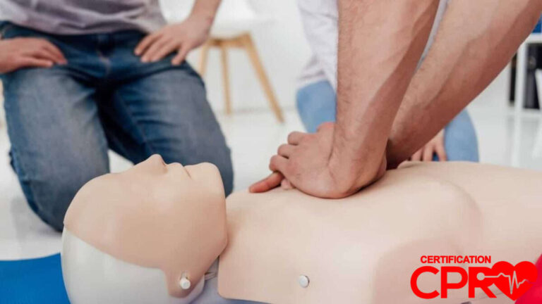 CPR training session with a man practicing on a mannequin in Jacksonville.